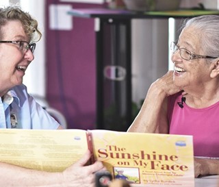 Dementia care educator Gail Higgenbotham connects with patient Tomasa.