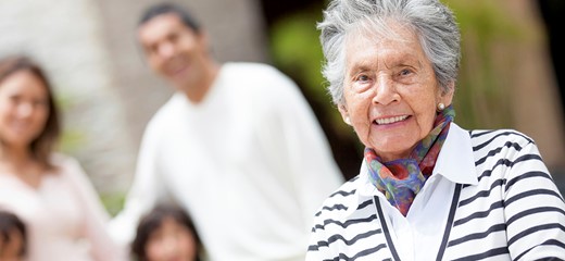 Patients stands with her supportive family