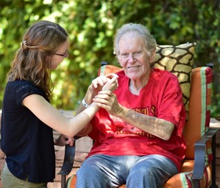 Volunteer comforting dementia patient