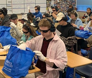 Seniors at Arcadia High School in Phoenix use virtual reality devices to approximate dementia symptoms.