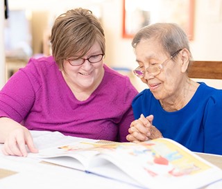 Amy Chengalaram with Asian Patient Pura Agudo
