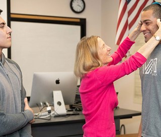 Gillian Hamilton teaching student about dementia behavior