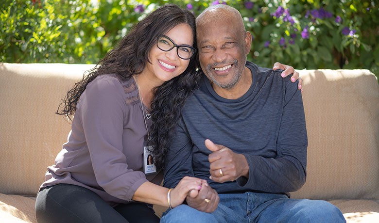 Social Worker Melinda Fernandez with male dementia patient