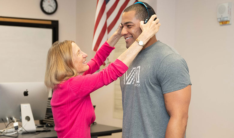 Gillian Hamilton teaching a student