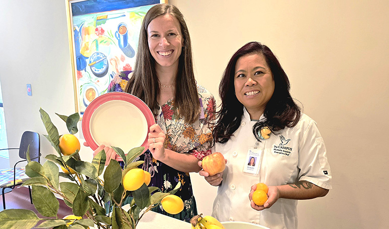Occupational therapist Calli Carlson and executive chef Michelle Ancheta prepare for mealtime.